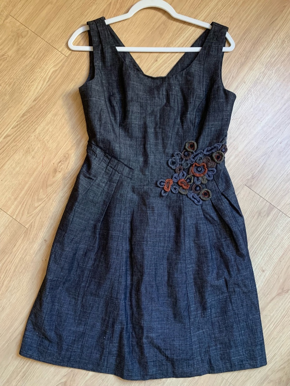 Tabitha Charcoal Sleeveless Dress with Floral Appliqué. 85% cotton.Size 8